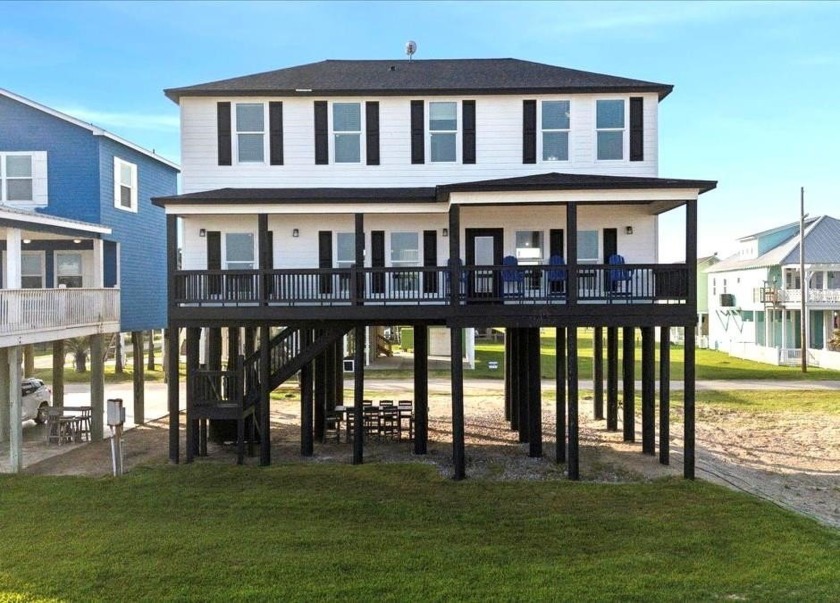 This newly constructed front-row beach cabin, located in the - Beach Home for sale in Port Bolivar, Texas on Beachhouse.com
