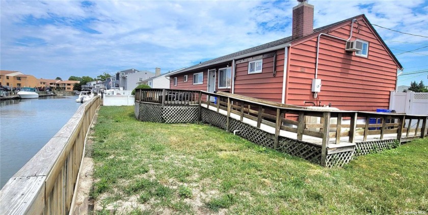 Beautiful  waterfront , 3/4 bedroom Cape with 1 full and 1 half - Beach Home for sale in Freeport, New York on Beachhouse.com