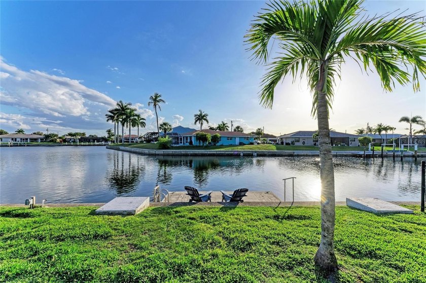 Waterfront Pool Home in Punta Gorda Isles with Wide Canal Views - Beach Home for sale in Punta Gorda, Florida on Beachhouse.com