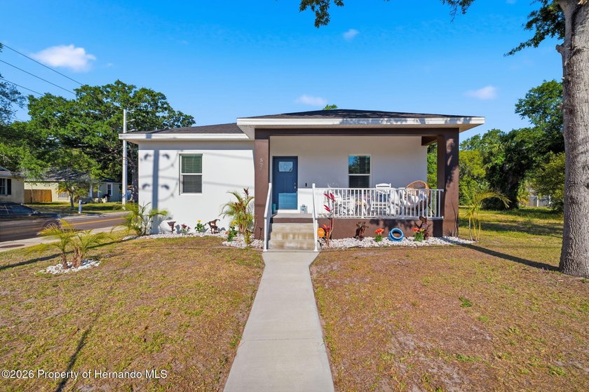 Nestled on a desirable corner lot in Tarpon Springs, this - Beach Home for sale in Tarpon Springs, Florida on Beachhouse.com