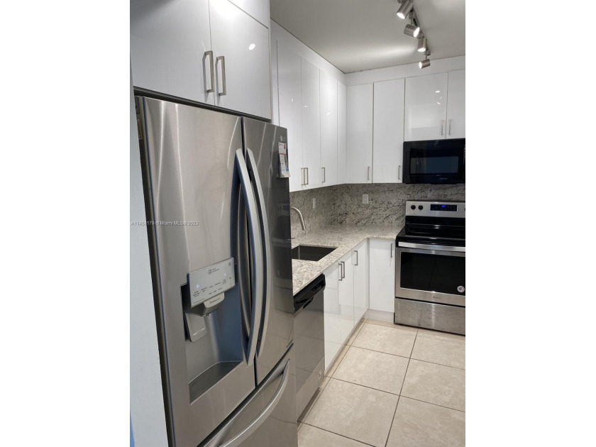 Completely remodeled unit with brand new custom European kitchen - Beach Condo for sale in Hallandale Beach, Florida on Beachhouse.com