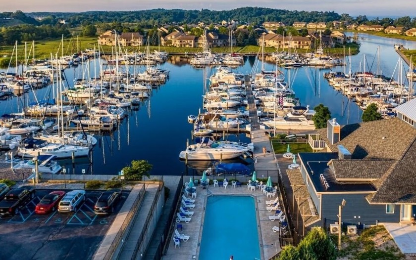 This boat 30 ft boat slip is located at Harbour Towne Marina - Beach Lot for sale in Muskegon, Michigan on Beachhouse.com