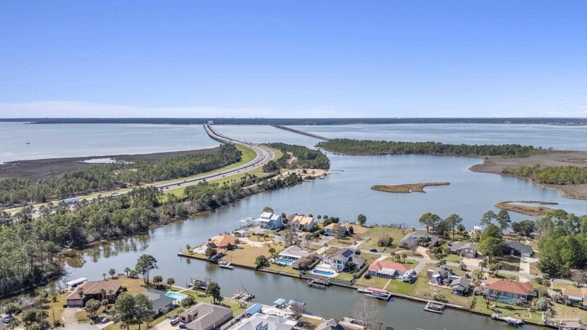 This charming waterfront pool home on the canal offers the - Beach Home for sale in Milton, Florida on Beachhouse.com
