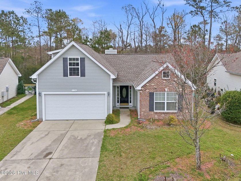 Beautifully maintained and freshly painted, this 4 bedroom, 3 - Beach Home for sale in Calabash, North Carolina on Beachhouse.com