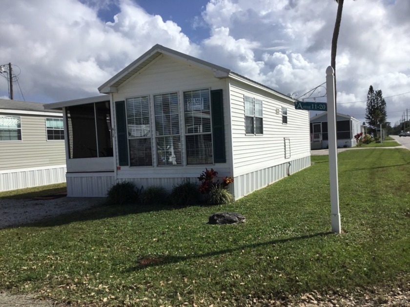 This quaint little home is the perfect place to land after your - Beach Home for sale in Merritt Island, Florida on Beachhouse.com