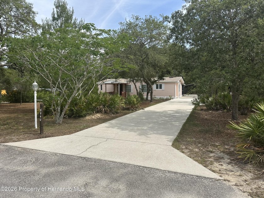 Experience True Privacy and Comfort with this Beautifully - Beach Home for sale in Spring Hill, Florida on Beachhouse.com
