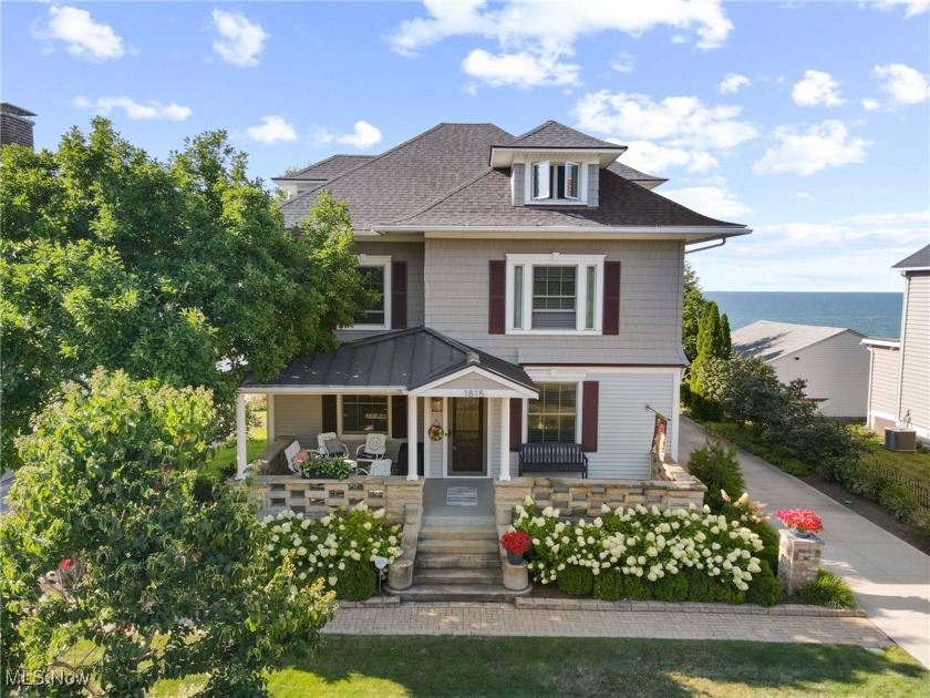 Welcome to this gorgeous lake front property. Built in 1900 and - Beach Home for sale in Lorain, Ohio on Beachhouse.com