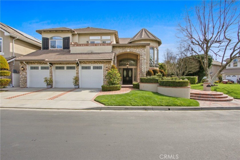 Nestled in a premier cul-de-sac location within the exclusive - Beach Home for sale in Rancho Santa Margarita, California on Beachhouse.com