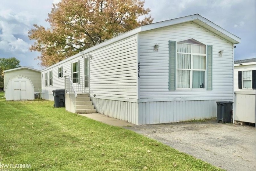 Welcome to this charming residence nestled in the desirable - Beach Home for sale in Shelby, Michigan on Beachhouse.com