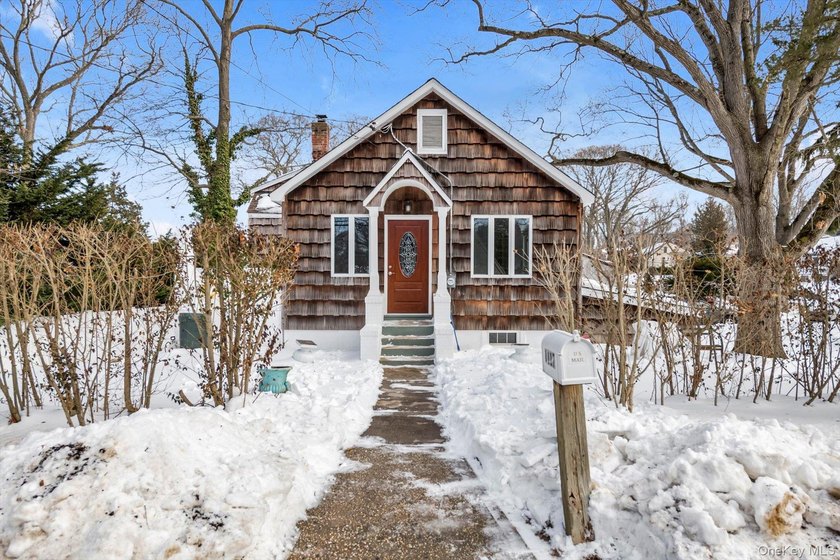 Definitely not ordinary. This 4 bedroom, 3 full bath house is - Beach Home for sale in Kings Park, New York on Beachhouse.com