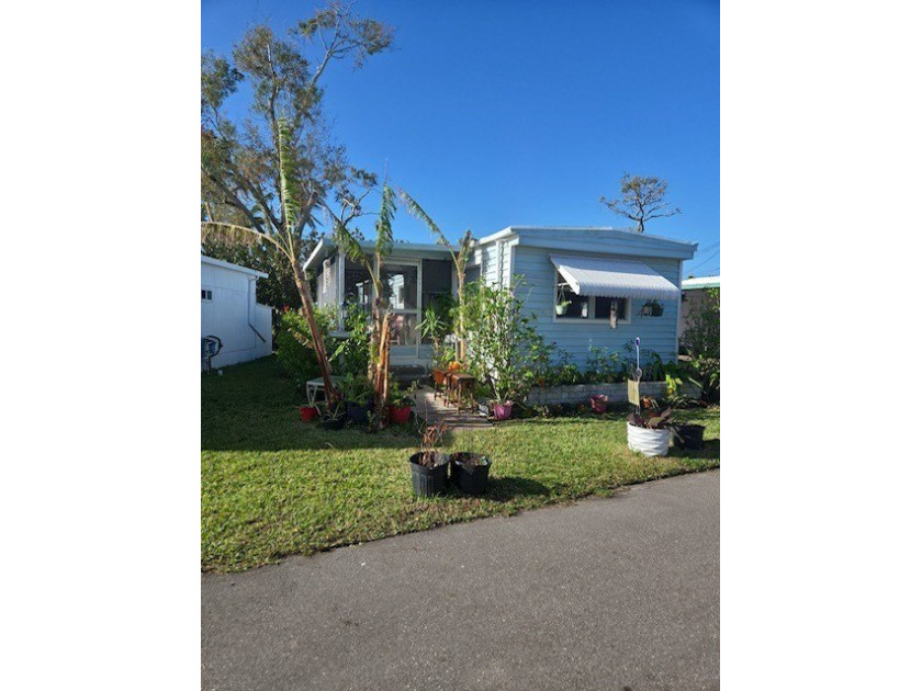 Nestled just a stone's throw from the scenic Manatee River, this - Beach Home for sale in Ellenton, Florida on Beachhouse.com