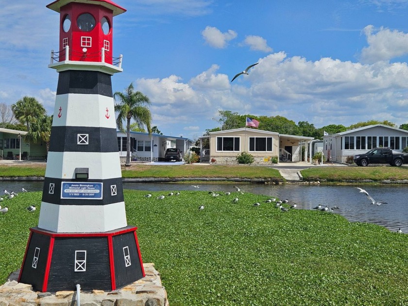 Amazing home with a waterfront view. Two large bay windows to - Beach Home for sale in New Port Richey, Florida on Beachhouse.com