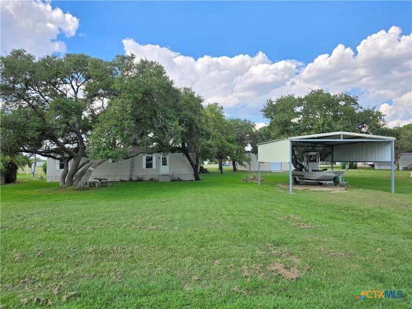 Discover your dream coastal retreat at 1501 Bayview Drive in - Beach Home for sale in Palacios, Texas on Beachhouse.com