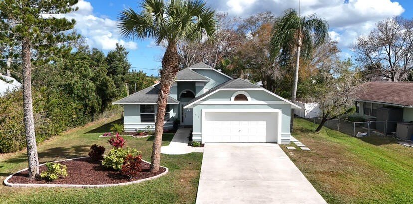 Welcome to this charming 3 bedroom, 2 bathroom home located at - Beach Home for sale in Port Saint Lucie, Florida on Beachhouse.com