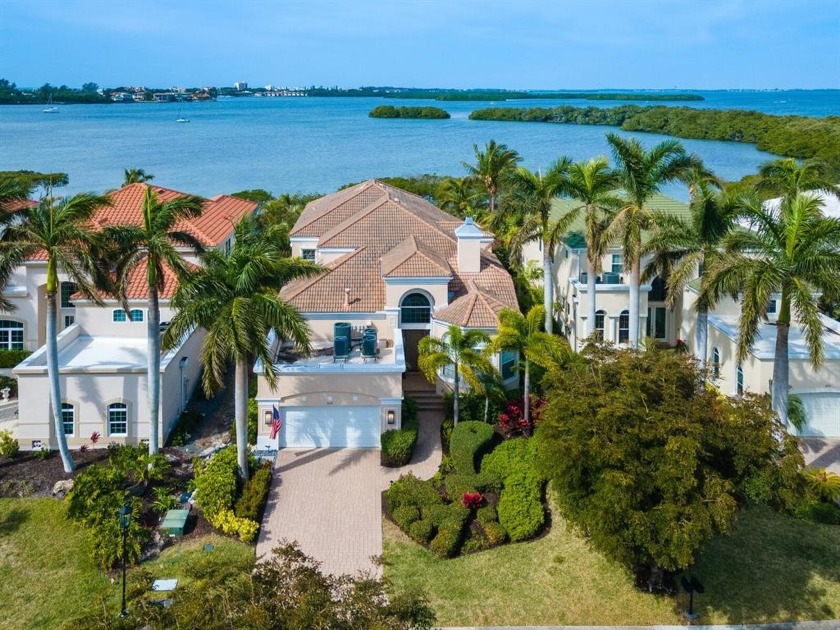 Located in prestigious Queens Harbour, behind the gates of Bay - Beach Home for sale in Longboat Key, Florida on Beachhouse.com