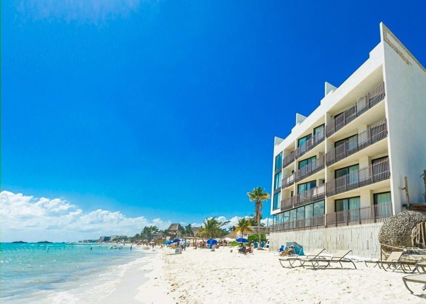 This stunning oceanfront penthouse in Playa del Carmen offers a - Beach Condo for sale in Playa Del Carmen,  on Beachhouse.com