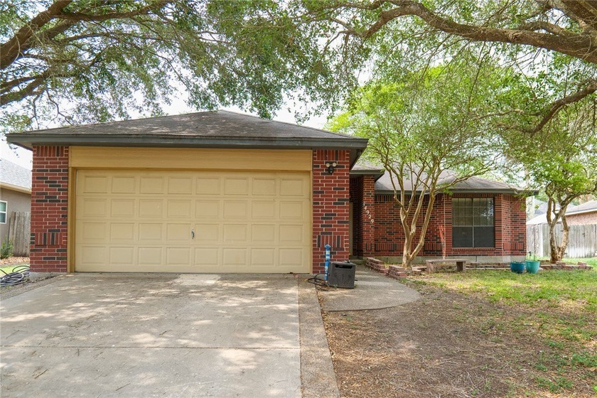 Tucked beneath a canopy of mature trees in Calallen, 14929 Red - Beach Home for sale in Corpus Christi, Texas on Beachhouse.com