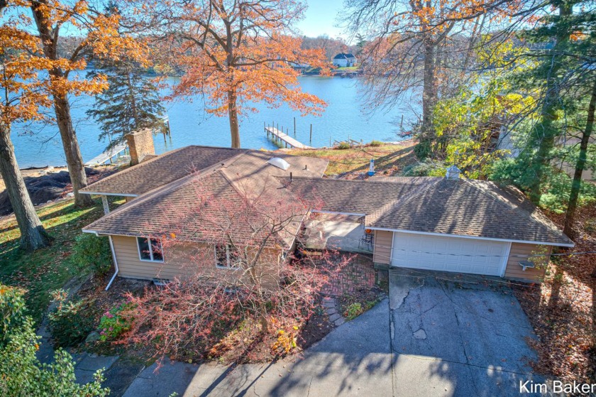 Nestled amidst the serene landscapes of Spring Lake, this - Beach Home for sale in Spring Lake, Michigan on Beachhouse.com