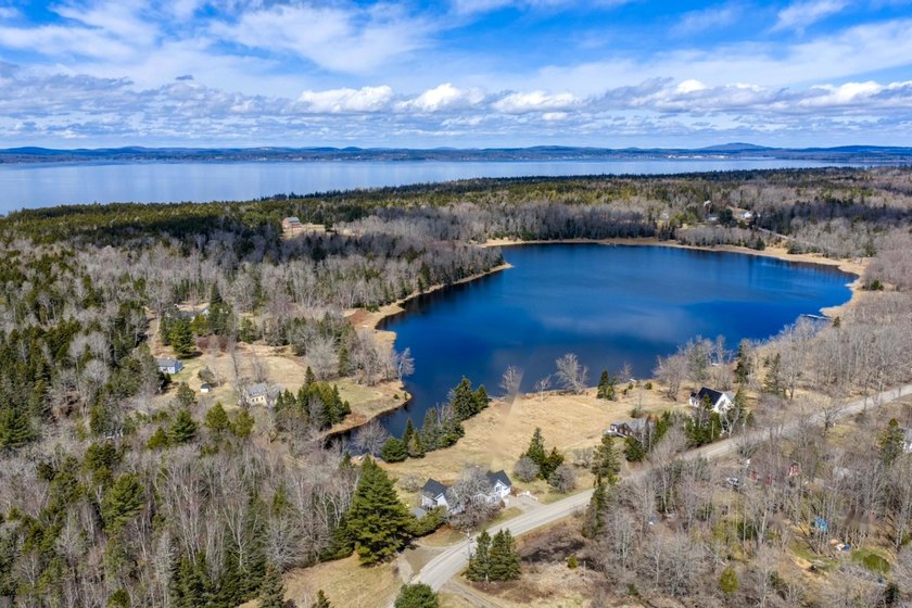 Set along the shore of Meadow Pond on Islesboro, this - Beach Home for sale in Islesboro, Maine on Beachhouse.com