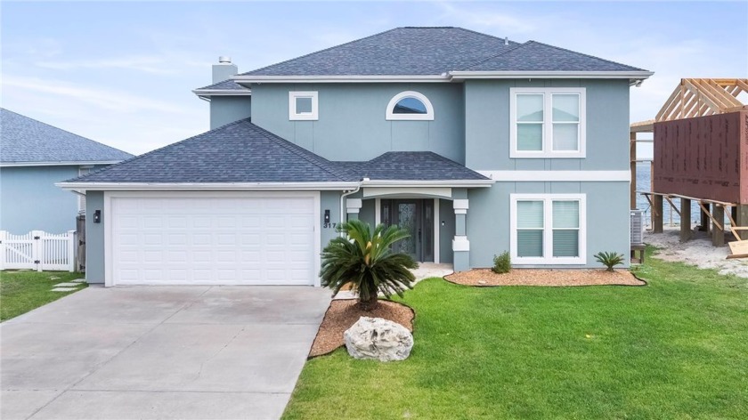 Live and entertain in style in this stunning 4-bedroom, 3-bath - Beach Home for sale in Aransas Pass, Texas on Beachhouse.com
