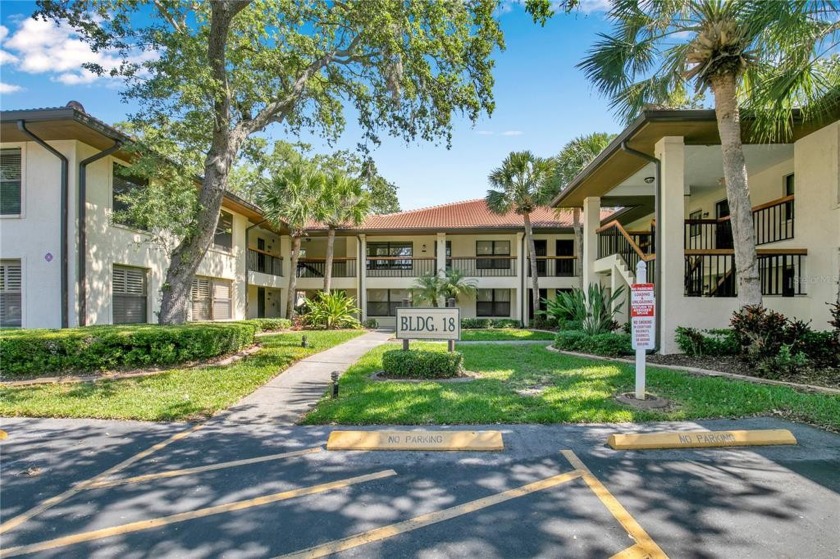 Newer remodel! Beautiful 2nd floor, corner unit tucked into the - Beach Condo for sale in Clearwater, Florida on Beachhouse.com