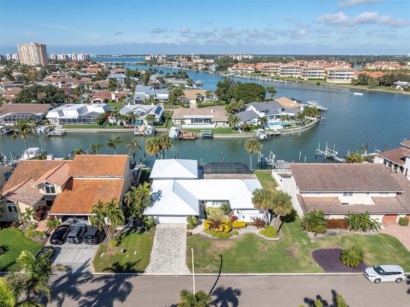 Located within the prestigious guard-gated Bayway Isles - Beach Home for sale in St. Petersburg, Florida on Beachhouse.com
