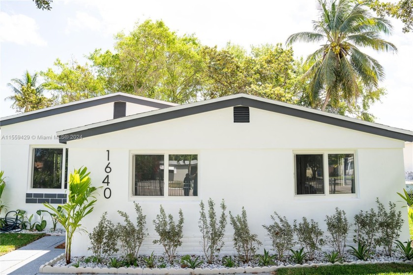 WELCOME TO THIS MODERN 3/2 COMPLETELY REMODELED HOME.  STEP - Beach Home for sale in North Miami Beach, Florida on Beachhouse.com