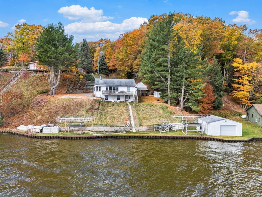 Charming Hamlin Lake cottage with 100 ft of private waterfront - Beach Home for sale in Ludington, Michigan on Beachhouse.com