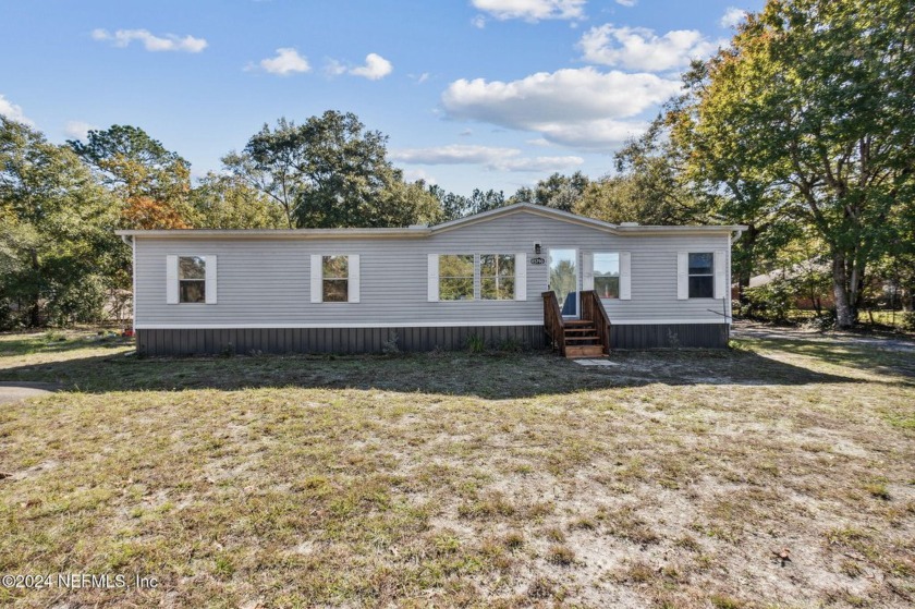 Charming 4/2 Home on 1 Acre - Your Peaceful Retreat Awaits! This - Beach Home for sale in Yulee, Florida on Beachhouse.com