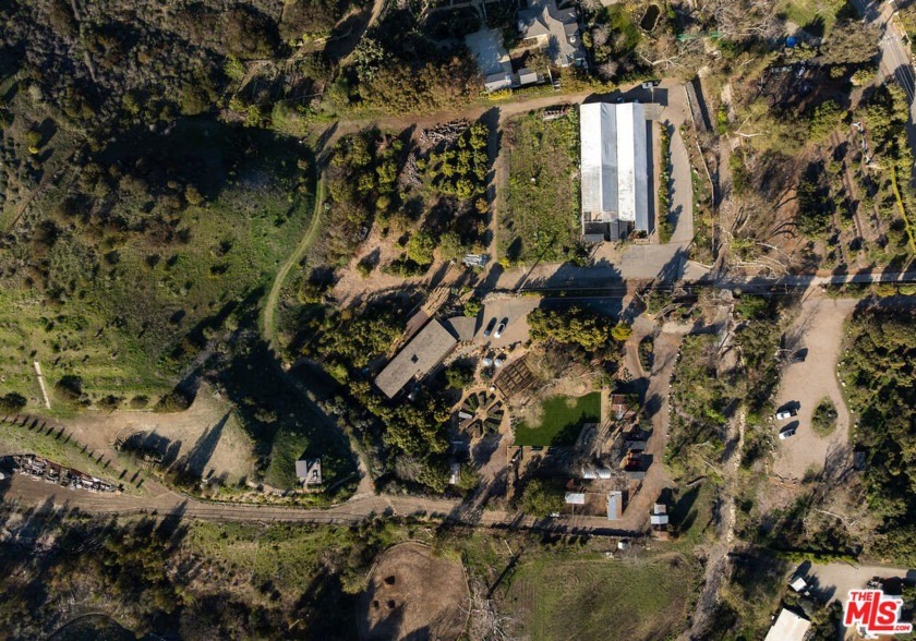 Tucked away in Malibu's iconic Bonsall Canyon, this nearly - Beach Home for sale in Malibu, California on Beachhouse.com