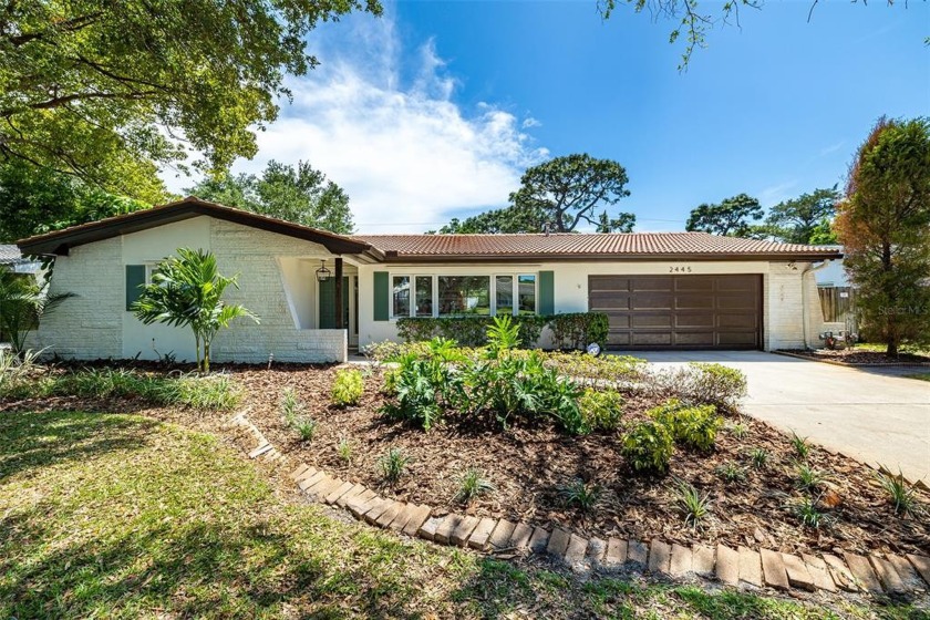 DESIGNER UPDATED POOL HOME! This home offers 3 bedrooms, 2 baths - Beach Home for sale in Clearwater, Florida on Beachhouse.com