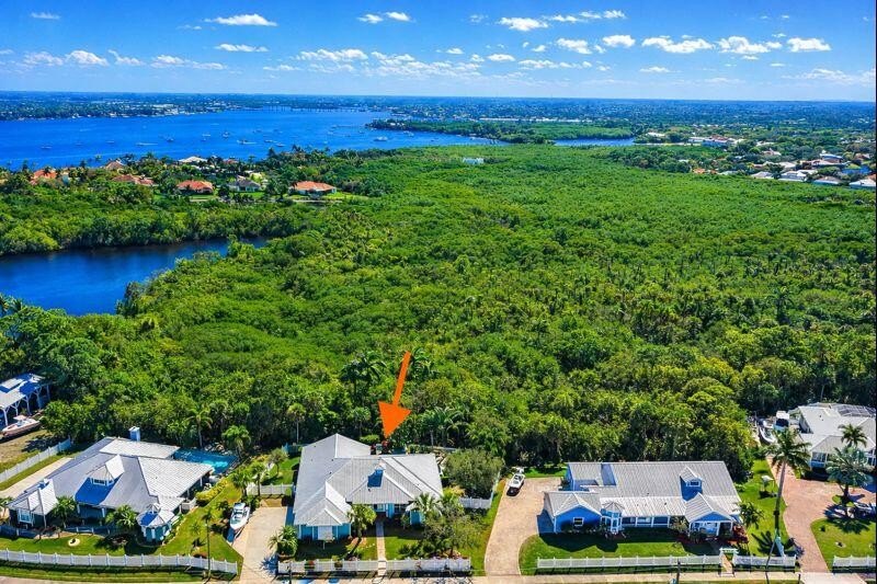 Stunning custom home on over one-half acre that backs to an - Beach Home for sale in Palm City, Florida on Beachhouse.com