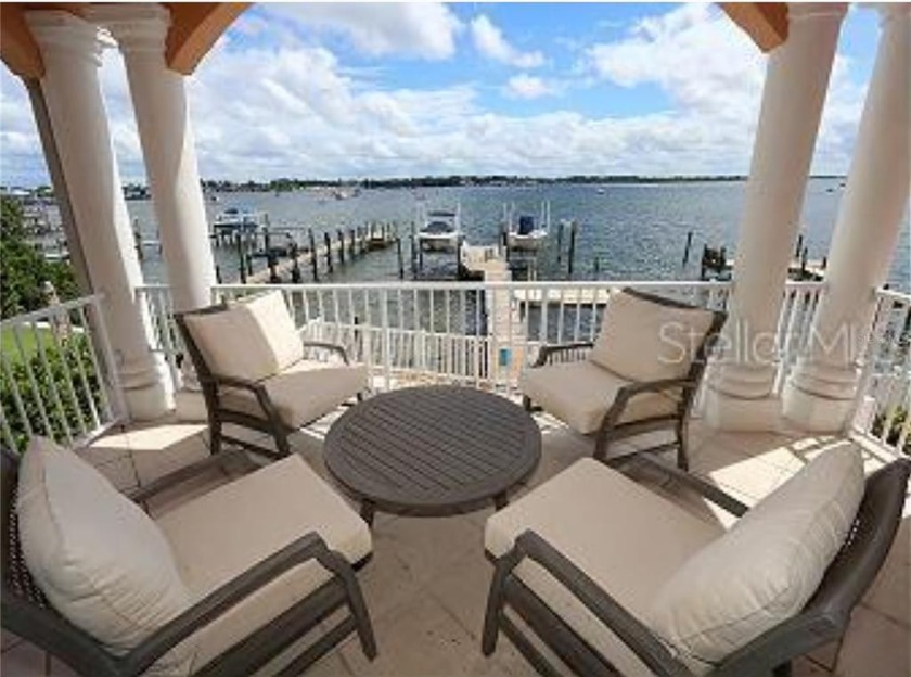 Indulge in the ultimate island lifestyle at the Hibiscus - a - Beach Condo for sale in Bradenton Beach, Florida on Beachhouse.com