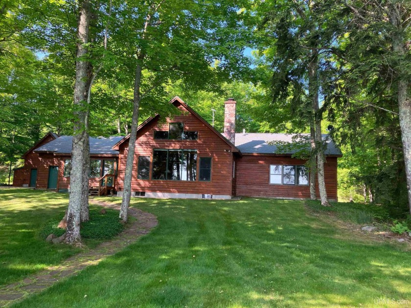 Come on in, settle down and enjoy the view!  This beautiful home - Beach Home for sale in Au Train, Michigan on Beachhouse.com