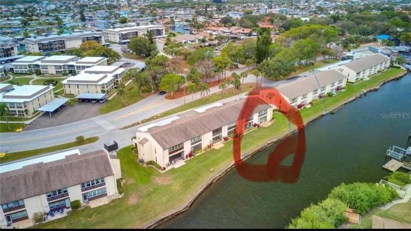 Ready for water action? This end unit condo offers just that! - Beach Condo for sale in New Port Richey, Florida on Beachhouse.com