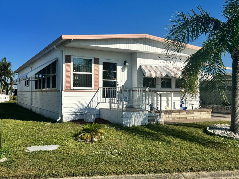 Step into your dream coastal retreat with this 1970 two bedroom - Beach Home for sale in Bradenton, Florida on Beachhouse.com