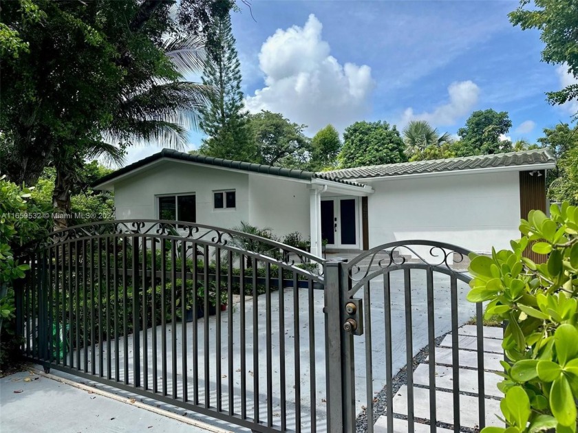 Discover this renovated and beautiful single-family home on a - Beach Home for sale in South Miami, Florida on Beachhouse.com