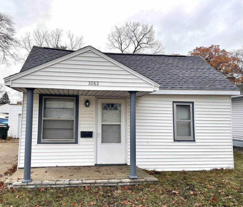 Welcome to 2062 West Sherman Blvd, Muskegon, MI 49441! This - Beach Home for sale in Muskegon, Michigan on Beachhouse.com