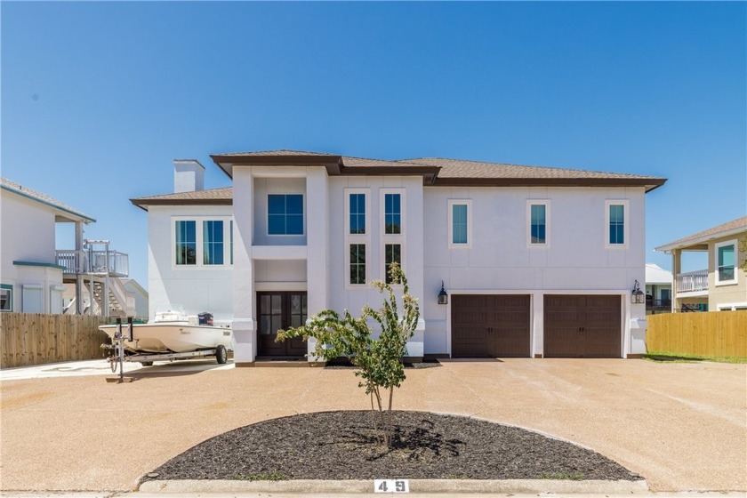 Welcome to 49 Curlew, a stunning custom waterfront residence - Beach Home for sale in Rockport, Texas on Beachhouse.com