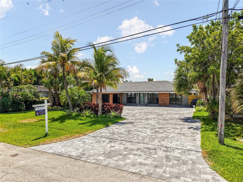 Welcome to this stunningly remodeled waterfront retreat in the - Beach Home for sale in Wilton Manors, Florida on Beachhouse.com