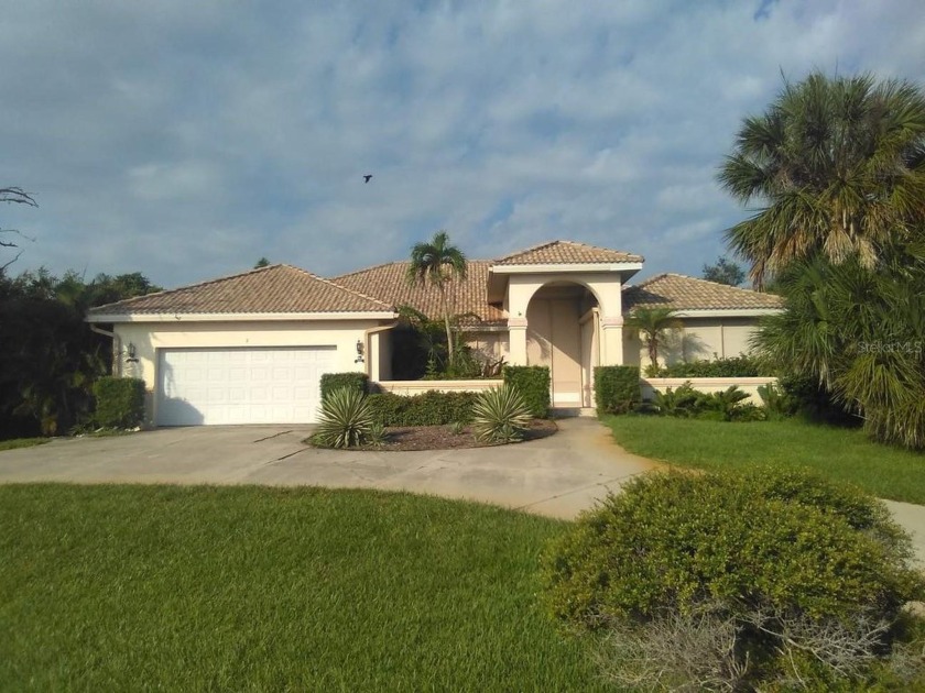 This charming 3-bedroom, 2-bathroom Florida pool home sits on - Beach Home for sale in Placida, Florida on Beachhouse.com
