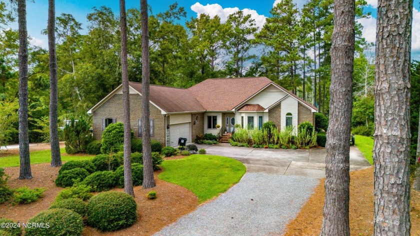 Nestled on a serene, wooded lot with meticulous landscaping - Beach Home for sale in Oriental, North Carolina on Beachhouse.com