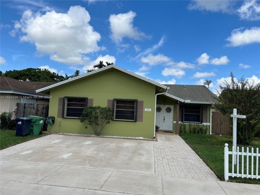 Reduced! Come see this lovely three bedroom two bath single - Beach Home for sale in Miami, Florida on Beachhouse.com