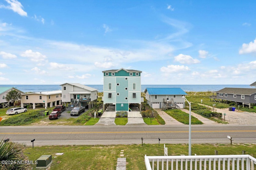 Gorgeous OCEAN VIEW'S  from this stunning 2nd row 3 bedroom 2.5 - Beach Home for sale in Oak Island, North Carolina on Beachhouse.com