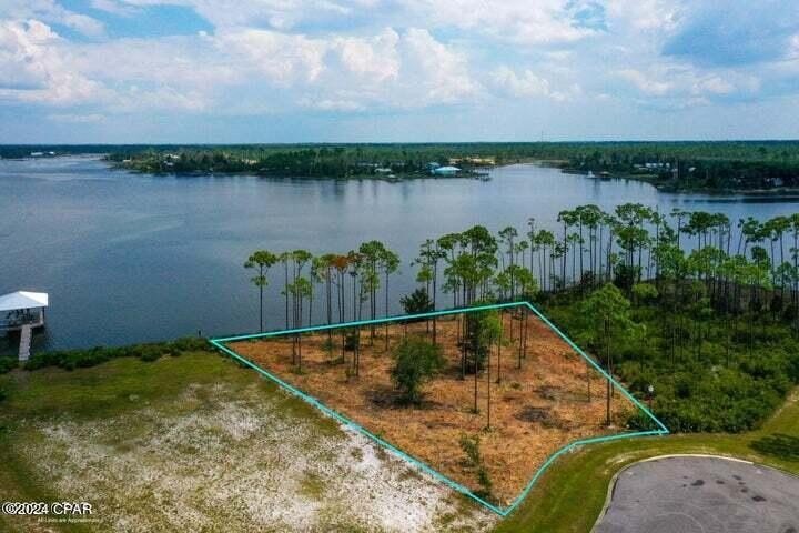 This stunning waterfront lot offers a rare opportunity to build - Beach Lot for sale in Panama City, Florida on Beachhouse.com