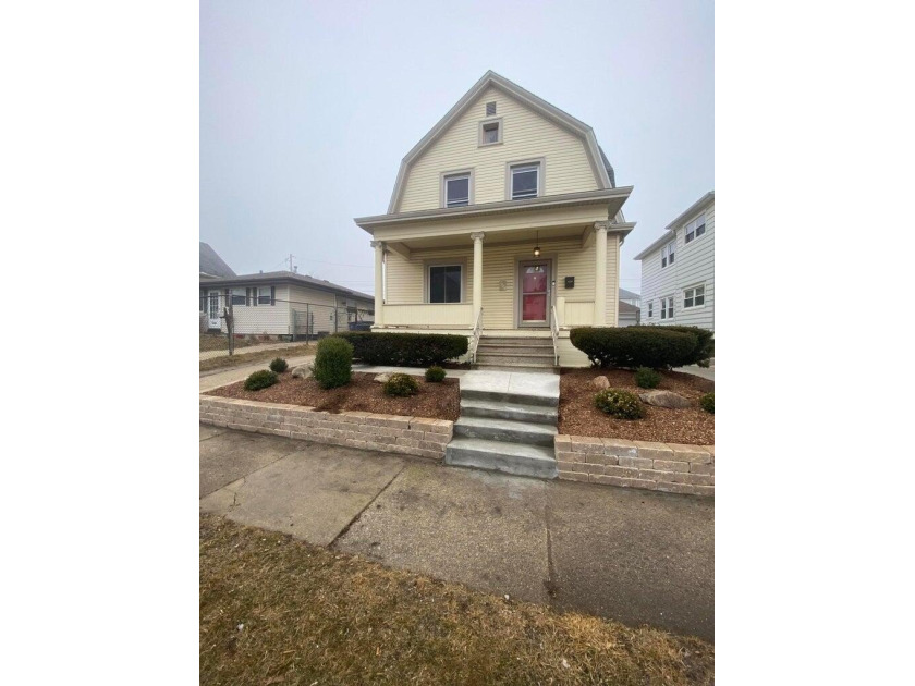 Completely remodeled and move-in ready! This modern home offers - Beach Home for sale in Racine, Wisconsin on Beachhouse.com