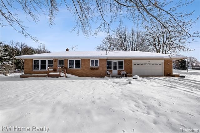 This sprawling brick ranch sits on a 2.36 acre corner lot and - Beach Home for sale in Holland, Michigan on Beachhouse.com