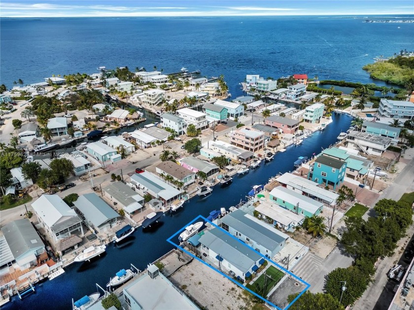 Tastefully remodeled, double wide, canal front home with 12 - Beach Home for sale in Key Largo, Florida on Beachhouse.com