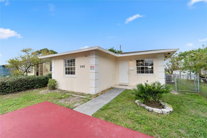 Built in 2004, this light-filled 3-bedroom, 2-bath home is - Beach Home for sale in Hallandale Beach, Florida on Beachhouse.com