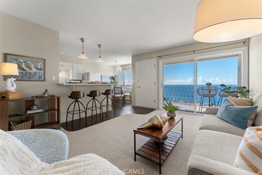 Immerse yourself in coastal luxury with this captivating - Beach Condo for sale in Laguna Beach, California on Beachhouse.com